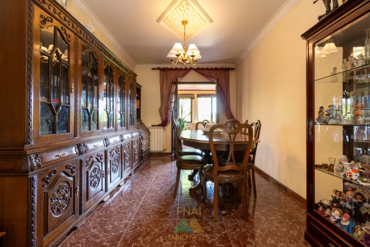 Formal dining room with ornate carved sideboard